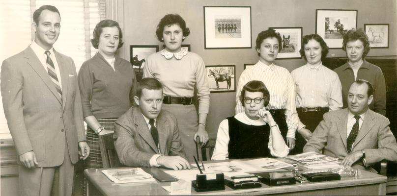 Hackett, Bob; Mr. Hackett and a few others share his desk