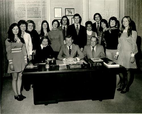 Hackett, Bob; Mr. Hackett with his staff, later in his business career