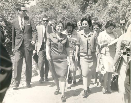 Johnson, Lyndon B. and Ladybird; The First Lady walking in a crowd