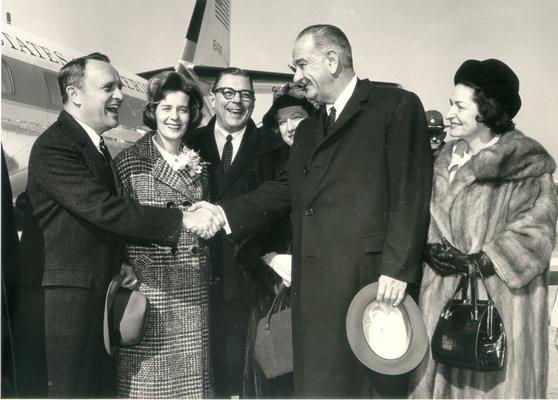 Johnson, Lyndon B. and Ladybird; Governor Edward T. Breathitt shaking hands with LBJ and Ladybird