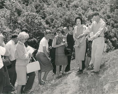 Johnson, Lyndon B. and Ladybird; Ladybird Johnson and others standing on a hill