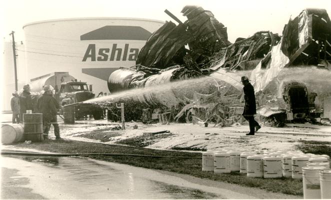 Ashland Bulk Oil Plant; 1973 Explosion and Fire; Fireman spraying down tanker cab