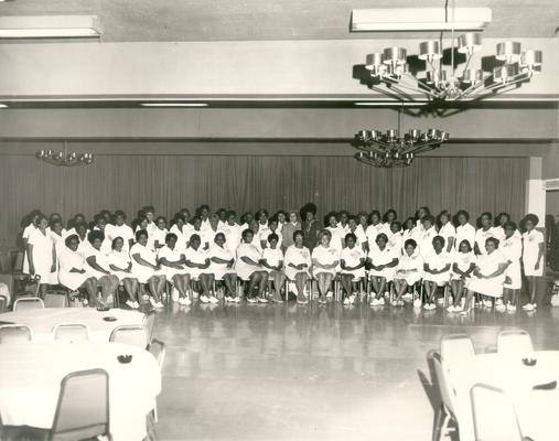 Groups; Unidentified; A large group of African American women dressed in white, with two other women in formal clothes