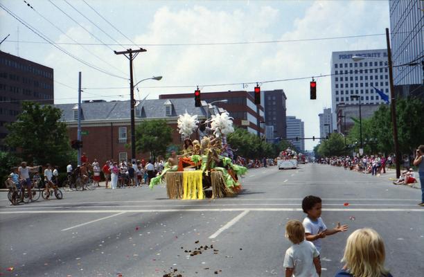 Cafe LMNOP parade truck, Drag mermaids and mermans, parade watchers at the Lexington Fourth of July parade