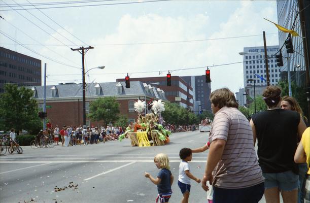 Cafe LMNOP parade truck, Drag mermaids and mermans, parade watchers at the Lexington Fourth of July parade