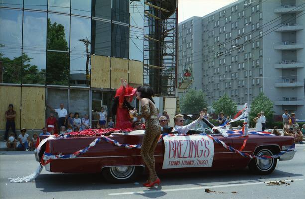 Brezing Piano Lounge/Disco Cadillac car, some people in drag costume, near Elm Tree Lane