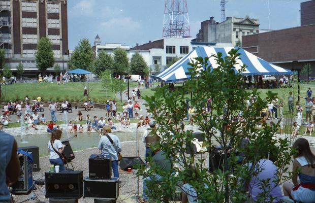 Band and audience in park