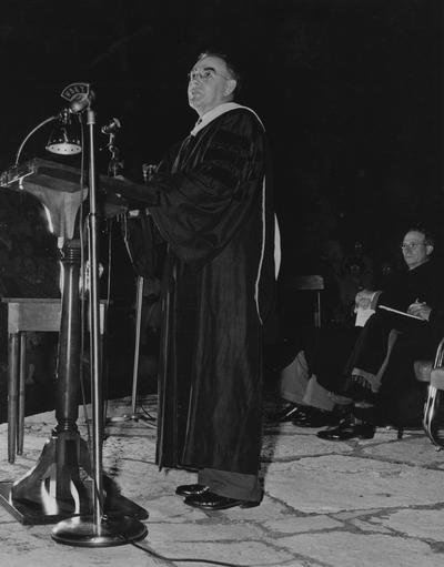 Crabb, Alfred L., Sr., pictured speaking at Summer 1948 Commencement in Memorial Hall Amphitheatre, Public Relations Department, Photographer: Mack Hughes