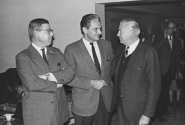 Creech, Glenwood L., Alumnus, B.S., 1941; M.S., 1950, Vice President of University of Kentucky Relations and Professor of Extension Education, Research Specialist in Vocational Education, 1965 - 1973, President of Florida Atlantic University, 1973 - 1983, pictured center with two unidentified individuals, Public Relations Department photograph