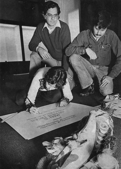 Duffield, Lathel, Professor and Chair, Anthropology Department, pictured back left with two unidentified individuals