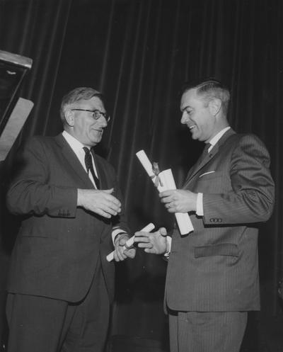 Francis, Sir Frank, pictured receiving the Kentucky's Colonel Commission from President Frank G. Dickey in the Guignol Theater, April 30, 1963