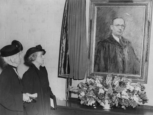 Funkhouser, William D., Professor of Zoology and Anthropology, Anthropology Department, Dean of Graduate School, Photo of portrait of Funkhouser unveiled by Mrs. Hugh Clark Funkhouser (left), mother of W. D. Funkhouser and Josephine Funkhouser, wife of W. D. Funkhouser