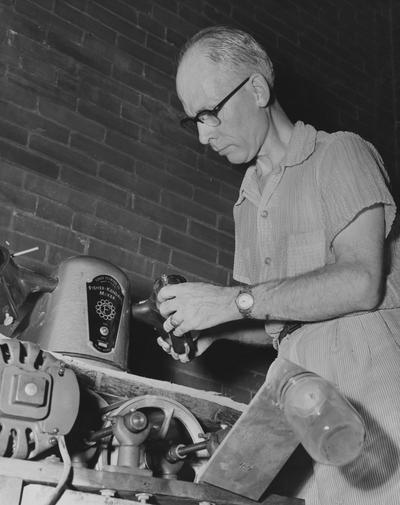 Kendall, Thomas A., University of Kentucky Research analysis in the mining lab, photograph by Mack Hughes, Public Relations Department