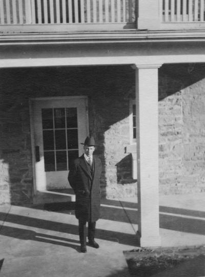 Smith, Guy, Instructor of Mathematics 1918-1920, pictured in his room during Christmas time