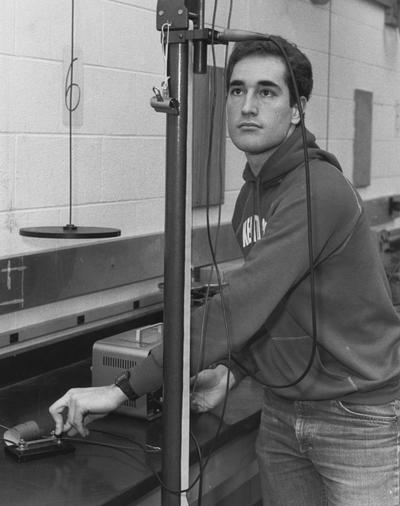 Wade, Tommy, Student of Chemistry and Physics, pictured in laboratory, photographer: Bill Wells, Photographic Services Image # 26576