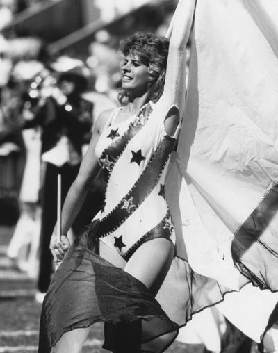 Unidentified, University of Kentucky Football Flag Corp woman (Marching Band), photographer: John Mitchell
