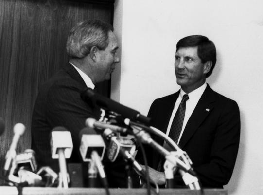 Curry, Bill, Head football coach, 1990 - 96, shown (r) with C. M. Newton, Athletics Director, 1989 - 2000