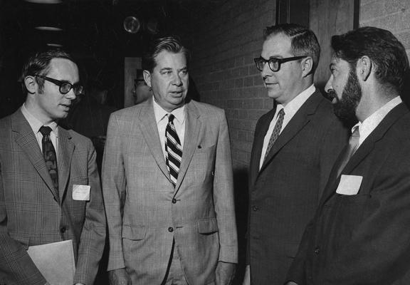 Cochran, Lewis W., Professor, Chemistry Department, Vice President for Academic Affairs, pictured second from left with Gary Christian, Galen Frysinger, Henry Bauer, attending a conference sponsored by the Graduate School, Public Relations Department