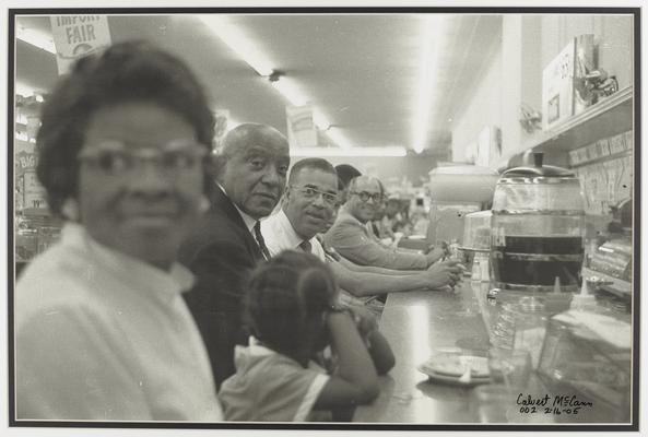 Sit-in at a downtown Lexington lunch counter, (from left) Reverend W. H. Howard, Reverend J. S. Beverly, and Reverend A. B. Lee