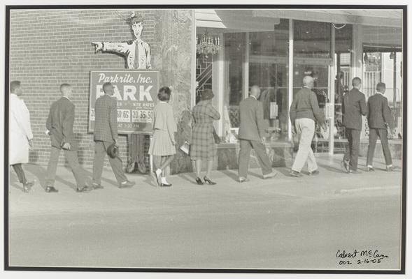 Demonstrator's marching past Main Street, Lexington stores