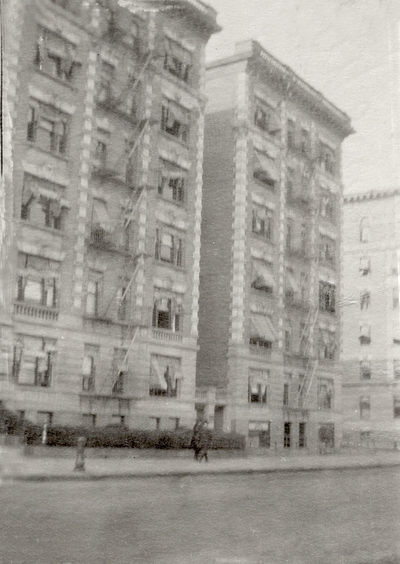 An image of seven story apartment building, with a note on the back of the print that says, 