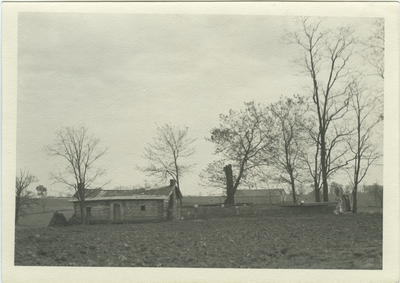 One story slave cabin and grave yard on Kentucky Governor Isaac Shelby's property; written on back 