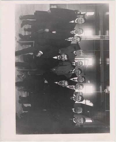 Legislature Committee including J. B. Newman (front row, left); Judge E. C. O'Rear? (front row, right); S. J. Patrick (back row, third from right); C. W. Mathews (back row, second from right)