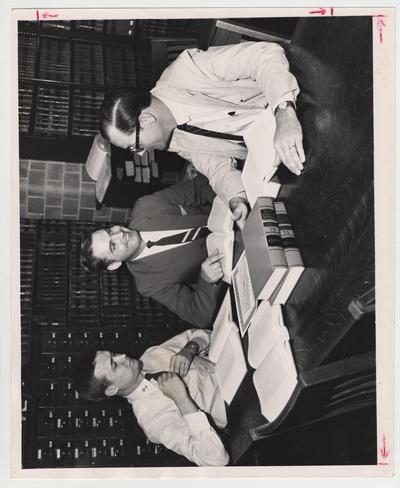 Winners in a will - drafting contest, sponsered by the University of Kentucky College of Law, are from left to right: Luther House (first), Arthur E. Abshine (second), and Henry Snyder (third); The men won $100, $50, and $25; Lexington Herald - Leader staff photo