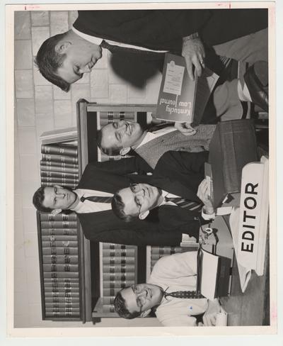 Members of the Kentucky Law Journal; From left to right seated: James Park, Jr., Leslie Morris II, and Glen Green; Standing: Thomas P. Lewis, law professor, and Jesse Hall