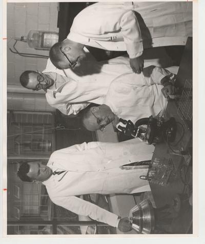 Bacteriology or Microbiology; Dr. Scherago seated