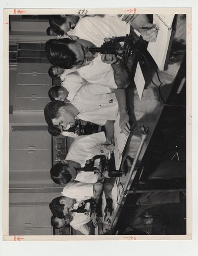 Students in a Pharmacy laboratory; Photographer: Ben L. Williams