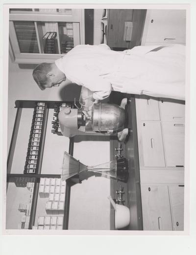 Man working in Pharmacy laboratory