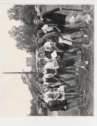 Women on the field with rugby equipment