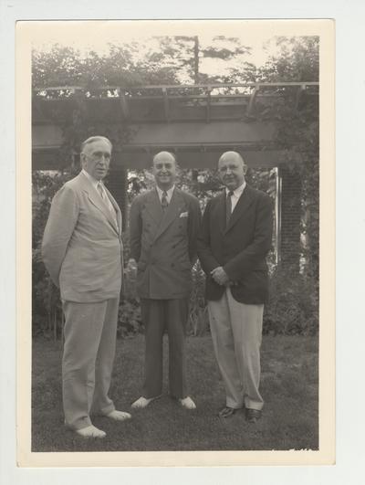 From left to right: President Frank L. McVey and Governor Keen Johnson with an unidentified man