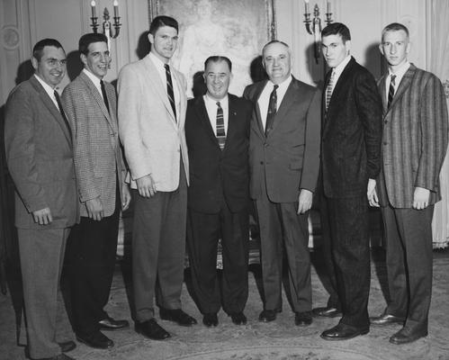 Basketball team members, 1958 championship season, (left to right) unidentified, Bill Lickert, Ed Beck, Governor A. B. 