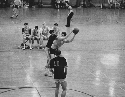 Unidentified students playing intramural basketball game; photo appears on page 95 in the 1969 Kentuckian