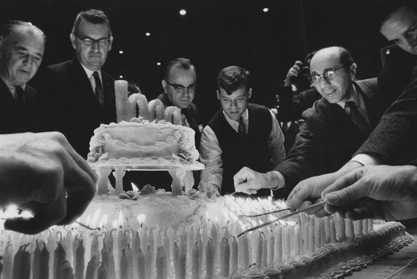 UK Athletic Board celebrates UK basketball's 1000th victory with a celebration cake; photo appears on page 387 in the 1969 Kentuckian