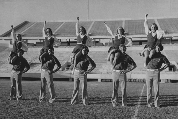 Five unidentified male and female cheerleaders at Commonwealth Stadium