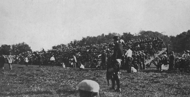 Unidentified people watching a football game. Photo appears on page 123 in the 1912 Kentuckian