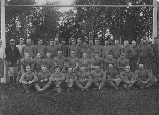 Football team photo; names of individuals listed on photograph sleeve
