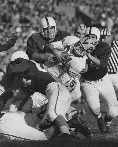 Unidentified football players during game against unidentified opponent; The Kentuckian photo