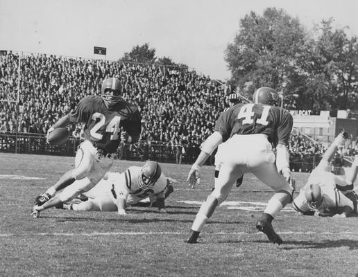 Dicky Lyons (24) carrying the ball against Ole Miss