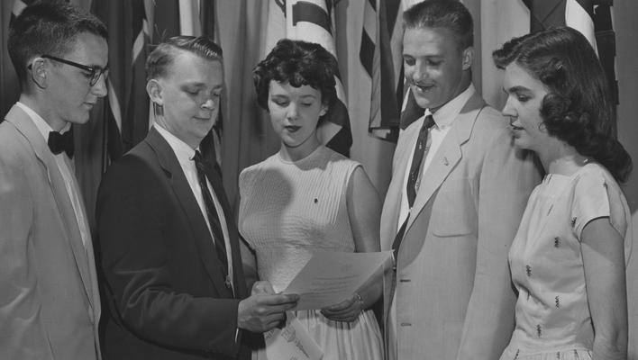 Five students honored for being in the top three percent of the 1957 graduating class; names of individuals listed on photograph sleeve; Lexington Herald-Leader photo