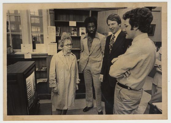 Rosemary Pond (left) and David Farrell (left), with two unidentified men