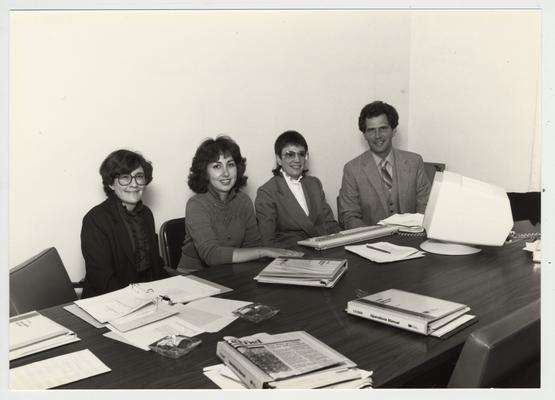 Gail Kennedy (second from left) and Mike Lach sit with two unidentified women; Submitted for use the the 1983 / 1984 annual Report