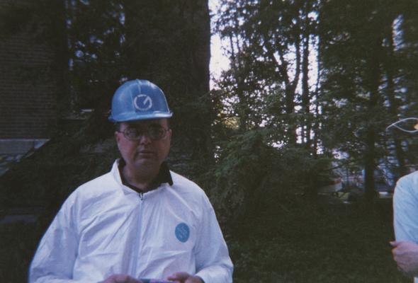 Administration Building fire, May 15, 2001; Terry Birdwhistell, University Archives, in front of building