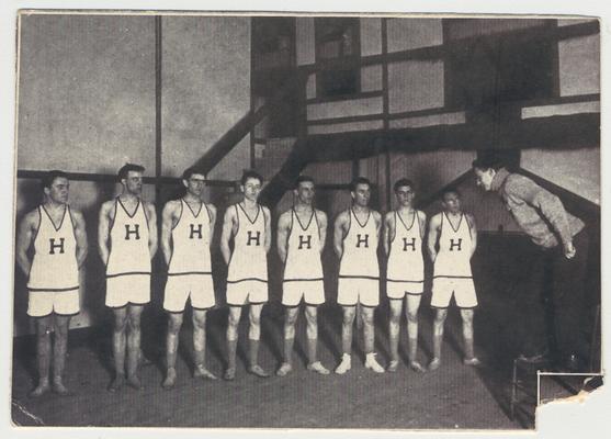 The Strollers theater group portraying a basketball team in an unidentified play.  This image is in the 1912 Kentuckian on page 311