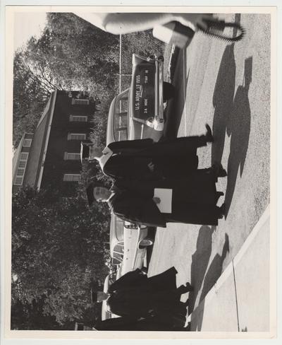 President Frank Dickey (first man on right) walking in a processional with faculty members at his inauguration ceremonies