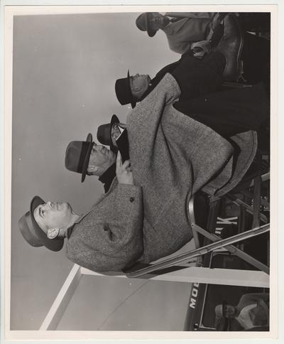 The ground breaking ceremony for the University of Kentucky Medical Center.  From left to right: President Frank Dickey with a book, Governor A. B. 