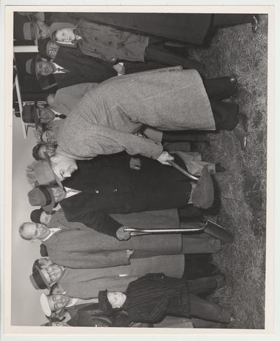 President Frank Dickey shoveling dirt at the ground breaking ceremony for the University of Kentucky Medical Center